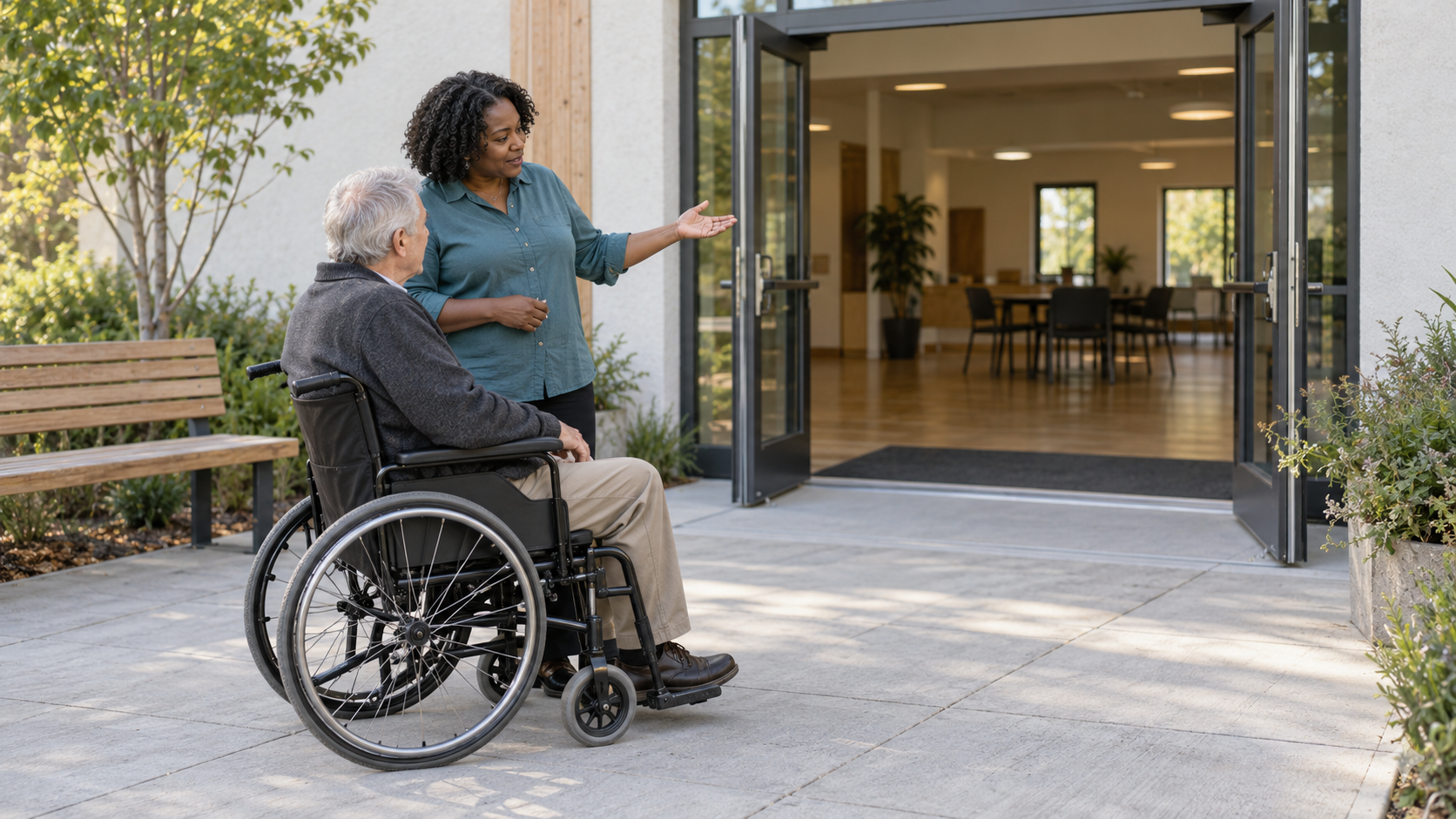 A wheelchair user and community organizer discussing an open meeting-place entrance